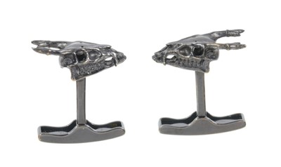 Lot 518 - Pair of black rhodium plated 18ct gold cufflinks in the form of stag skulls, sponsor's mark OPD, hallmarked 2009.