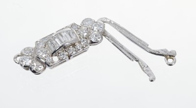 Lot 524 - Art Deco diamond clasp with baguette cut and single cut diamonds, in white gold setting, approximately 18mm.