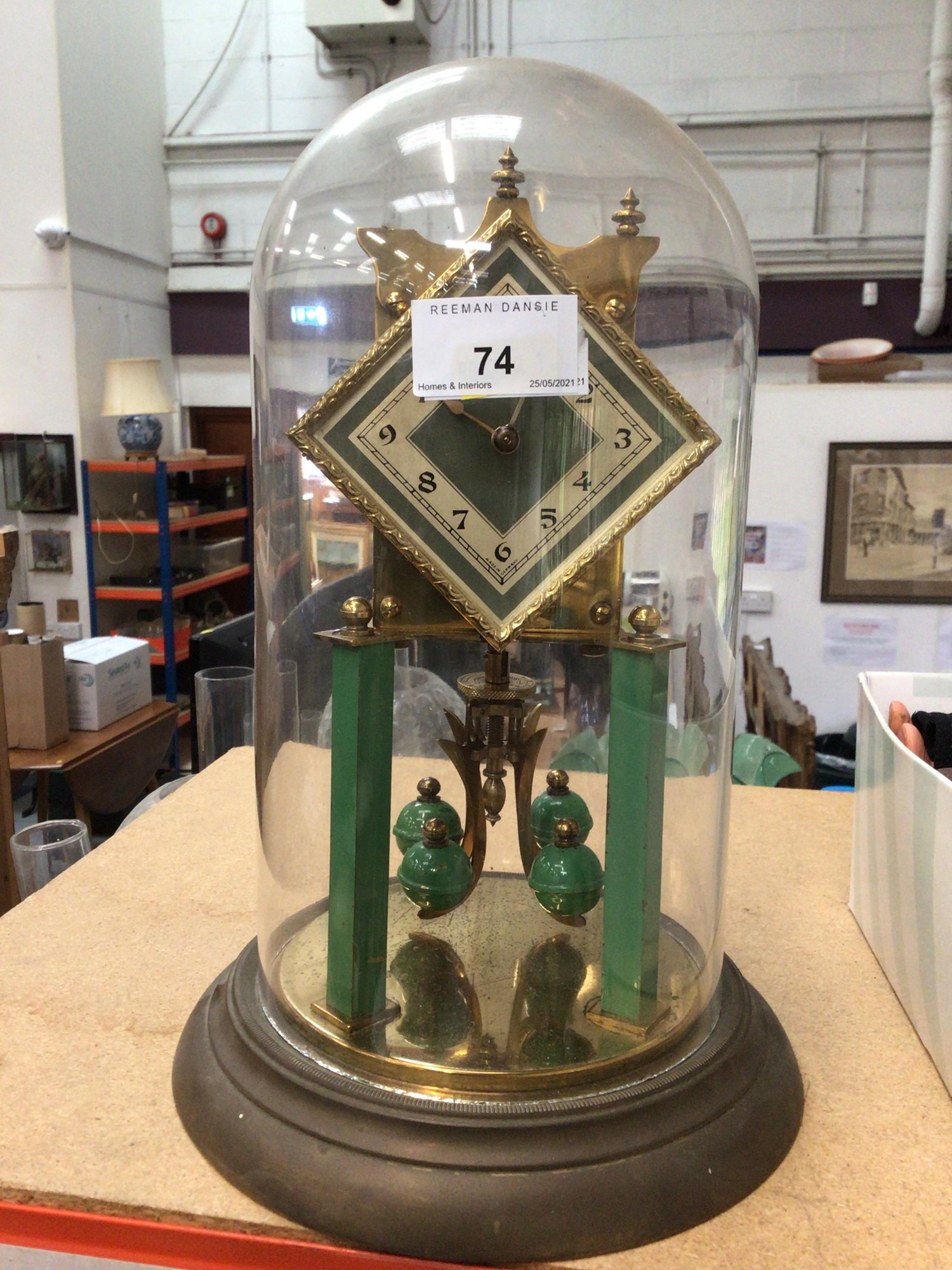 Lot 74 Anniversary clock under a glass dome
