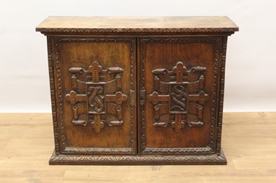 Lot 1402 - 19th century carved walnut mural cupboard, enclosed by two doors, each carved with cruciform banners with Latin mottos - Vigila Ora Labora and Soli Deo Gloria, 76cm wide x 27cm deep x 60cm high