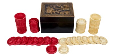 Lot 869 - Fine 19th century Chinese export carved and stained ivory chess/droughts/backgammon pieces -set of 32 pieces decorated with Chinese figures, horses and elephants in lacquer counter box, together...