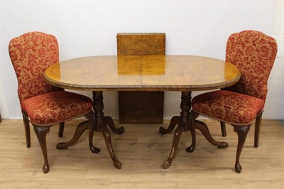 Lot 1391 - Suite of Queen Anne revival dining room furniture, comprising twin pedestal extending dining table, extending to 207 x 97cm, suite of six upholstered walnut dining chairs, including a pair of crook...