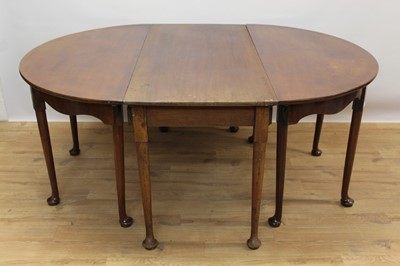 Lot 1359 - George III mahogany three section dining table on turned legs with pad feet