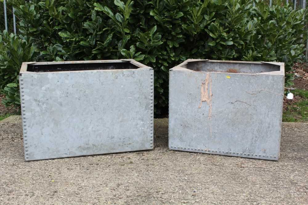 Lot 1361 - Two old galvanised and riveted metal water tanks