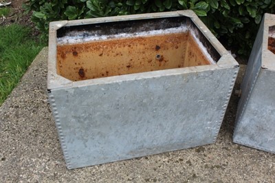 Lot 1361 - Two old galvanised and riveted metal water tanks