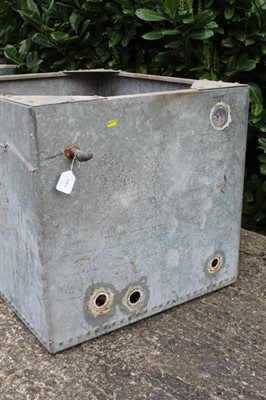 Lot 1361 - Two old galvanised and riveted metal water tanks