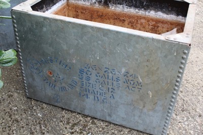 Lot 1361 - Two old galvanised and riveted metal water tanks