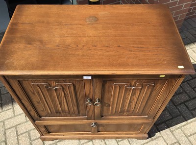 Lot 192 - Old Charm style oak cupboard/television cabinet