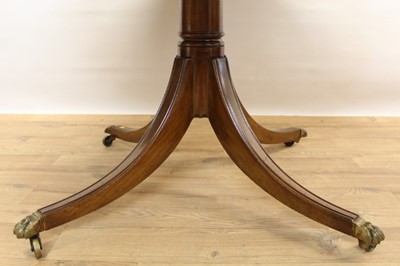 Lot 1354 - George III style mahogany circular pedestal dining table