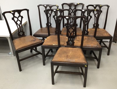Lot 165 - Set of seven Edwardian Chippendale revival mahogany dining chairs with pierced vase shape splat backs, brown leather seats on mould ped square chamfered legs