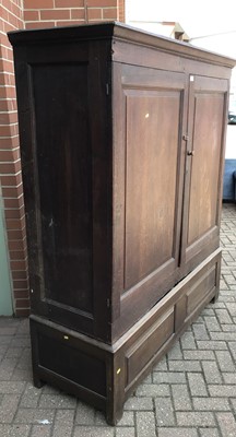 Lot 156 - Antique panelled oak cupboard enclosed by two panelled doors on base
