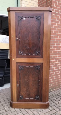 Lot 158 - 19th century mahogany two height corner cupboard enclosed by two doors