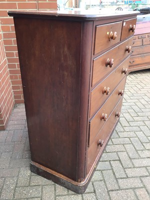 Lot 160 - Victorian mahogany chest of two short and three long graduated drawers with turned bun handles on separate plinth base