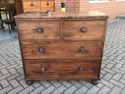 Lot 180 - 19th century mahogany chest of two short and two long graduated drawers with cock beaded edge and turned handles on bun feet