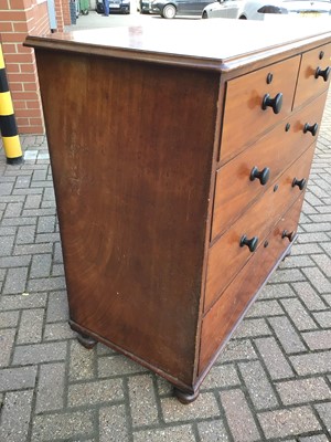 Lot 181 - Victorian mahogany chest of two short and three long graduated drawers with bun handles on turned feet