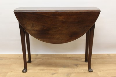 Lot 1368 - George II mahogany drop leaf table, with oval hinged top on turned legs and pad feet, 96 x 87cm