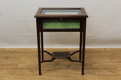 Lot 1366 - Victorian style mahogany bijouterie table, with bevelled glass top and sides on square tapered legs, 57cm wide