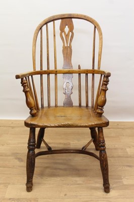 Lot 402 - 19th century ash and elm Windsor chair, with pierced vase splat and stick back, saddle seat on turned logs and crinoline stretcher