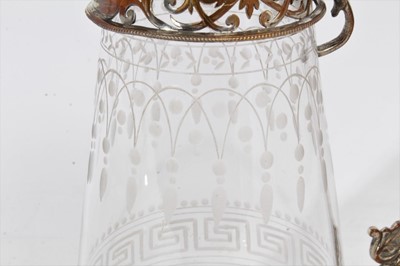 Lot 394 - Victorian glass claret jug of bulbous tapered form, with etched Greek key decoration, silver plated mount with pierced and engraved scroll decoration and hinged cover, 24.5cm overall height