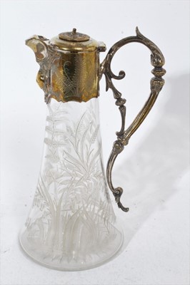 Lot 398 - Victorian cut glass claret jug of tapered form, with oval cut decoration and star cut base, silver plated mount with engraved inscription and hinged cover, 31cm overall height, together with three...