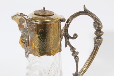 Lot 398 - Victorian cut glass claret jug of tapered form, with oval cut decoration and star cut base, silver plated mount with engraved inscription and hinged cover, 31cm overall height, together with three...