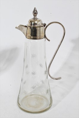 Lot 399 - Victorian cut glass claret jug of tapered form, with star cut decoration and star cut base, silver plated mount and hinged cover, 31cm overall height, together with three other various glass claret...