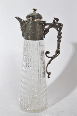 Lot 399 - Victorian cut glass claret jug of tapered form, with star cut decoration and star cut base, silver plated mount and hinged cover, 31cm overall height, together with three other various glass claret...