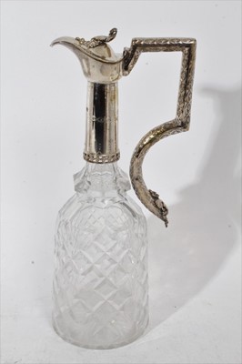 Lot 399 - Victorian cut glass claret jug of tapered form, with star cut decoration and star cut base, silver plated mount and hinged cover, 31cm overall height, together with three other various glass claret...