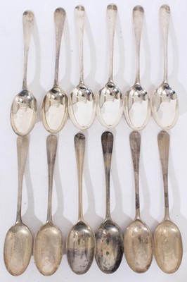 Lot 401 - Set of twelve silver Hanoverian Rat tail pattern dessert spoons, each engraved to underside with letter A, (Sheffield 1928 / 1932), maker Mappin & Webb, all at 21oz
