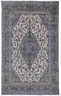 Lot 1339 - 20th century Persian Kashan rug with central lozenge shaped medallion, scrolling floral and foliate motifs, within multiple borders, on pale blue and cream ground, 325cm x 245cm