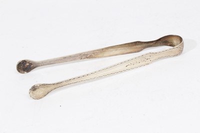 Lot 404 - Pair of George III silver sugar tongs with britecut engraved decoration, (London 1793), maker Peter & Ann Bateman, together with four other pairs of Georgian silver sugar tongs (various dates and m...