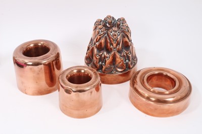 Lot 694 - Four antique copper jelly moulds