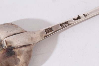 Lot 410 - George III silver fiddle pattern dish slice with pierced and engraved decoration, (London 1811), maker W T, together with a Georgian silver table spoon, sifter ladle and another silver ladle (vario...