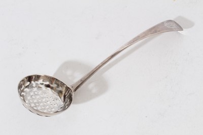 Lot 410 - George III silver fiddle pattern dish slice with pierced and engraved decoration, (London 1811), maker W T, together with a Georgian silver table spoon, sifter ladle and another silver ladle (vario...