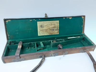 Lot 977 - Army & Navy brown canvas gun case