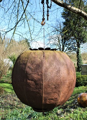 Lot 1876 - Islamic globular iron lantern with geometric piercing motifs, approximately 110cm diameter