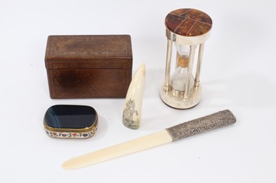 Lot 695 - Leather mounted folding cigarette box scrimshaw tooth, ivory page turner amber mounted egg timer and onyx box