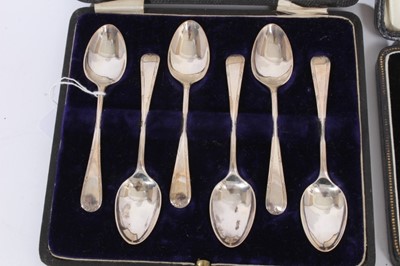 Lot 421 - Set of six George V silver coffee spoons in a velvet lined fitted case, (Sheffield 1910), together with as set of six George V silver bean end coffee spoons in a fitted case, (Birmingham 1931) and...