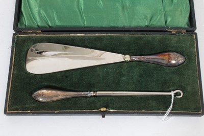 Lot 421 - Set of six George V silver coffee spoons in a velvet lined fitted case, (Sheffield 1910), together with as set of six George V silver bean end coffee spoons in a fitted case, (Birmingham 1931) and...