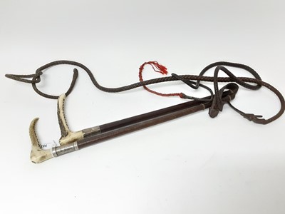 Lot 983 - Two silver mounted hunting whips, both with stag horn handles and leather covered shafts. One by Zair