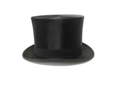 Lot 989 - Top hat by Thomas Townend in vintage brown leather case
