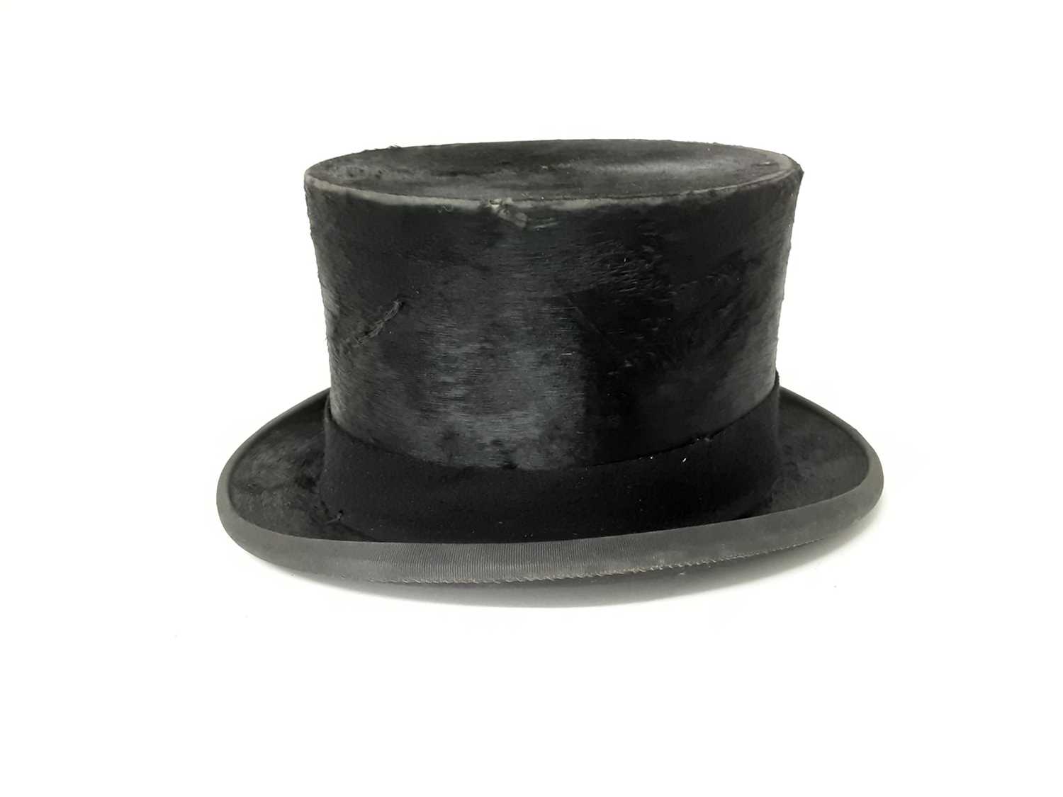 Lot 991 Two Herbert Johnson top hats, both in