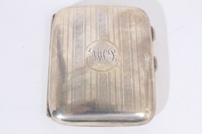 Lot 425 - George V silver cigarette case of domed rectangular form with reeded engine turned decoration, (Birmingham 1911) together with another similar cigarette case (Birmingham 1916) and another (Birmingh...