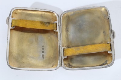Lot 425 - George V silver cigarette case of domed rectangular form with reeded engine turned decoration, (Birmingham 1911) together with another similar cigarette case (Birmingham 1916) and another (Birmingh...