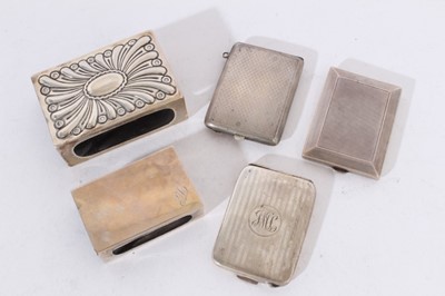Lot 428 - George V silver match book holder of rectangular form with reeded engine turned decoration, (Birmingham 1925), together with two other silver match book holders and two silver match box holders (va...
