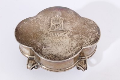 Lot 430 - Edwardian silver jewellery box, with engraved date to lid- 25th May 1905, raised on four feet, (Birmingham 1904), together with a George V silver jewellery box with engine turned decoration, (Chest...