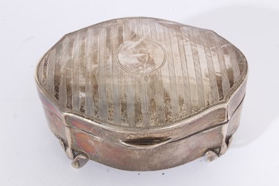 Lot 430 - Edwardian silver jewellery box, with engraved date to lid- 25th May 1905, raised on four feet, (Birmingham 1904), together with a George V silver jewellery box with engine turned decoration, (Chest...