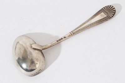 Lot 432 - William IV silver fiddle pattern caddy spoon (London 1831) together with three other silver caddy spoons and ladles (various dates and makers), all at approximately 4oz (4)
