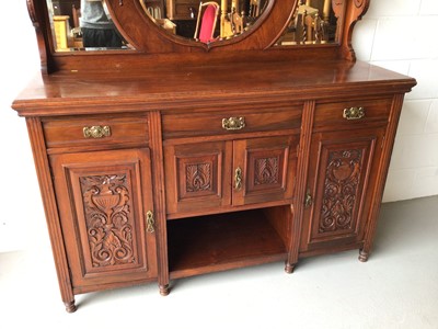 Lot 186 - Edwardian carved walnut two height sideboard with bevelled mirror back, three drawers and carved panelled doors below, 154cm wide, 54cm deep, 228cm high