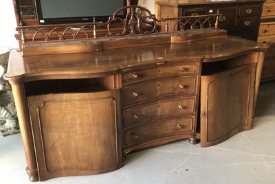 Lot 191 - Large 19th century style mahogany serpentine fronted sideboard with four central graduated drawers flanked by cupboards, 226cm wide, 73cm deep, 89cm high